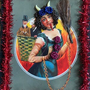 Reproduction Victorian “Lady Krampus” print decorated with Victorian inspired human hair work.