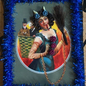 Reproduction Victorian “Lady Krampus” print decorated with Victorian inspired human hair work.