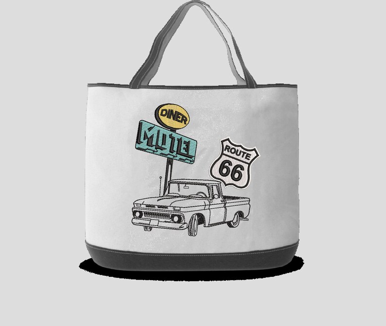 May include: A white canvas tote bag with a black handle. The bag features a vintage illustration of a pickup truck, a "Route 66" sign, and signs for a "Motel" and "Diner".