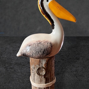 Hand Made Pelican on Pier Post