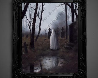 May include: A framed artwork depicting a ghostly figure in a white sheet standing in a misty graveyard. The painting features bare trees, tombstones, and a reflective pool of water. The frame is black with ornate detailing.