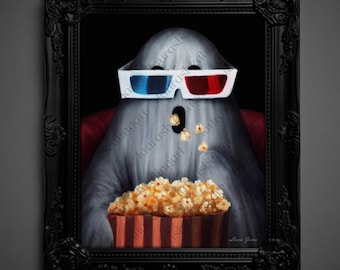 May include: A framed artwork depicts a gray ghost wearing 3D glasses, enjoying popcorn. The ghost is seated in a red chair, holding a striped popcorn container. The black frame has ornate detailing.