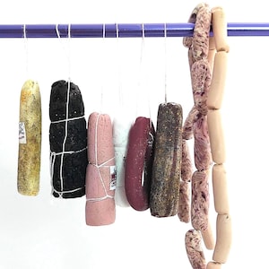 Köttutbud, skivbar salami, Bresaola, Cervelat, Bologna, Saucisson, Figatelli, fläsk och kryddad nötkorv