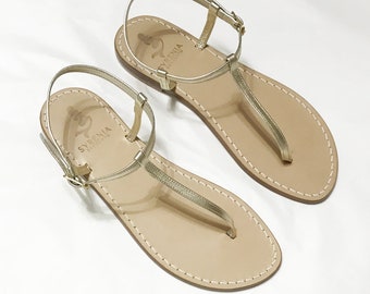 Gold Capri sandals with simple and elegant lines. Capri Sandals Syrenia handmade flip flop style. Capri sandals online shop Sandals woman
