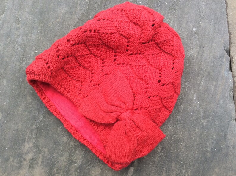 Girls Bonnet with adorable bow knitted in cherry red cotton yarn fashionable beanie with bow adorable and lined bonnet