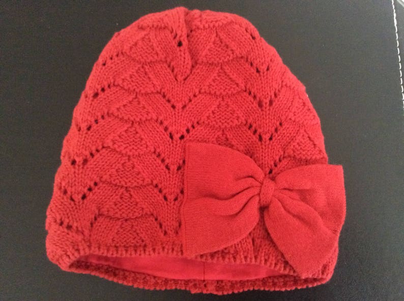 Girls Bonnet with adorable bow knitted in cherry red cotton yarn  fashionable beanie with bow  adorable and lined bonnet