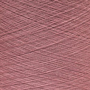 May include: Close-up of a large spool of dusty rose yarn. The yarn is tightly wound, creating a dense, textured surface. The threads are visible, forming a crisscross pattern. Ideal for knitting, crocheting, or other fiber arts projects.