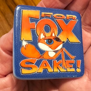 "For Fox Sake" ceramic gift magnet with cute, blue-eyed, foxy lady with funky fun cartoon words that are human-drawn by RandomFox, Kim Teems Fox.