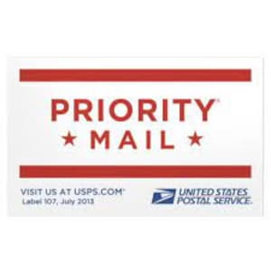 May include: White rectangular Priority Mail label with red horizontal stripes and text. The words "PRIORITY MAIL" are in red, with a star on each side. The bottom of the label includes the USPS logo and website address.