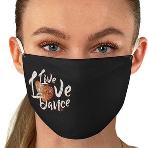 May include: Black face mask with the text "Live Love Dance" in white with a glittery orange heart.