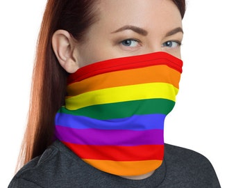 May include: A person wearing a face covering with the rainbow pride flag colors. The face covering is made of a soft, stretchy fabric and is designed to be comfortable to wear.