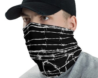 May include: A black face mask with a white barbed wire pattern. The mask is worn by a person wearing a black baseball cap.