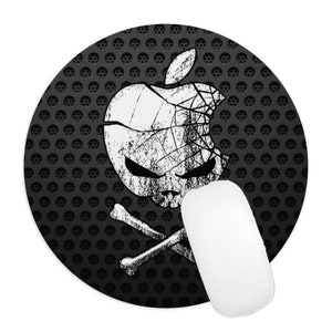 May include: A black and white mouse mat with a cracked apple skull and crossbones design on a black perforated background.