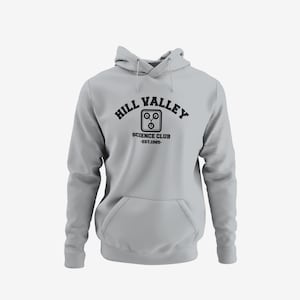 A gray hoodie with the text "HILL VALLEY SCIENCE CLUB" printed on it.