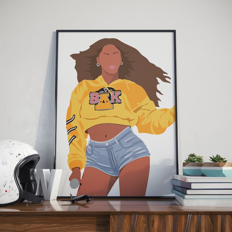 May include: A digital illustration of a woman with long brown hair wearing a yellow cropped hoodie with the letters "BAK" in pink and yellow on the front. She is wearing blue denim shorts and is holding a microphone.