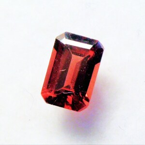 Nice 6 x 4 mm faceted emerald cut Mozambique Garnet