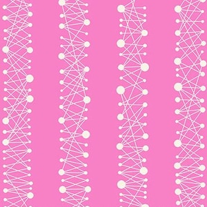May include: Pink fabric with a repeating pattern of white circles and lines. The lines connect the circles in a vertical striped design. A ruler is at the bottom of the image, with measurements in inches.