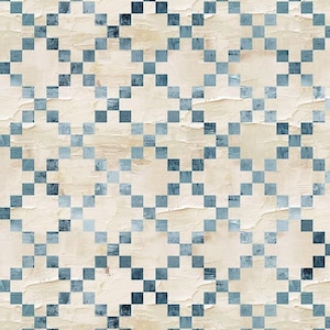 May include: A fabric with a repeating pattern of blue squares arranged in a diagonal grid. The background is a textured, off-white color, and the squares vary in shades of blue. The fabric has a vintage, distressed appearance, with a ruler along the bottom edge.
