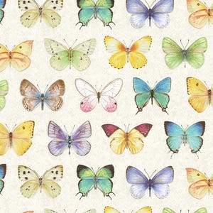 May include: A fabric pattern featuring a repeating arrangement of various butterflies in shades of blue, yellow, green, pink, and brown on a cream background, with a visible ruler at the bottom measuring up to 18 inches.