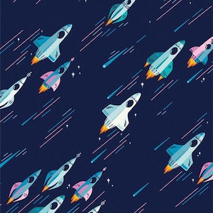 May include: A repeating pattern featuring cartoon rockets in blue, pink, and white on a dark blue backdrop. The rockets have flames and are accompanied by streaks and stars, creating a space-themed design.