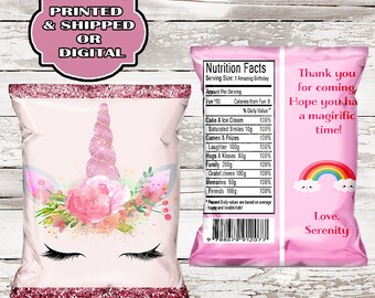 May include: Pink and white unicorn chip bag with a glitter border. The bag has a nutrition facts label with a fun theme. The back of the bag has a rainbow and the text "Thank you for coming. Hope you have a magirific time! Love. Serenity."
