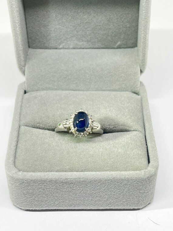 Solid Platinum 900 with 2ct genuine sapphire caboc