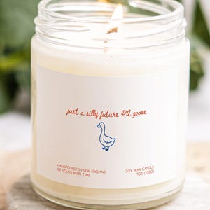 May include: A set of three ceramic mugs with a speckled, matte finish. The mugs are in shades of cream, light gray, and dark gray. Each mug has a simple, modern design and a rounded handle. Perfect for coffee or tea.