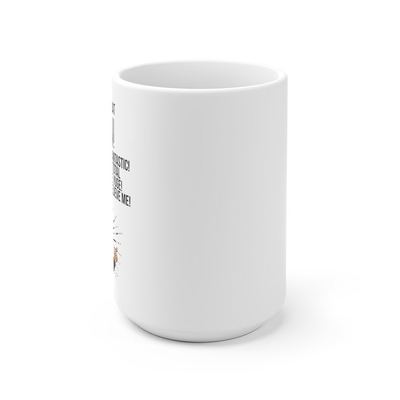 May include: White ceramic coffee mug with black text that reads "I'm not a morning person, I'm a total coffee addict, just believe me!" with a cartoon image of a person holding a coffee mug.