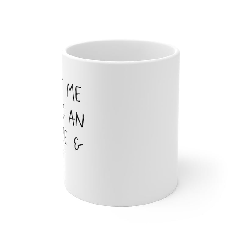 May include: White ceramic mug with black handwritten text that reads "Some days you just need a coffee & a nap".