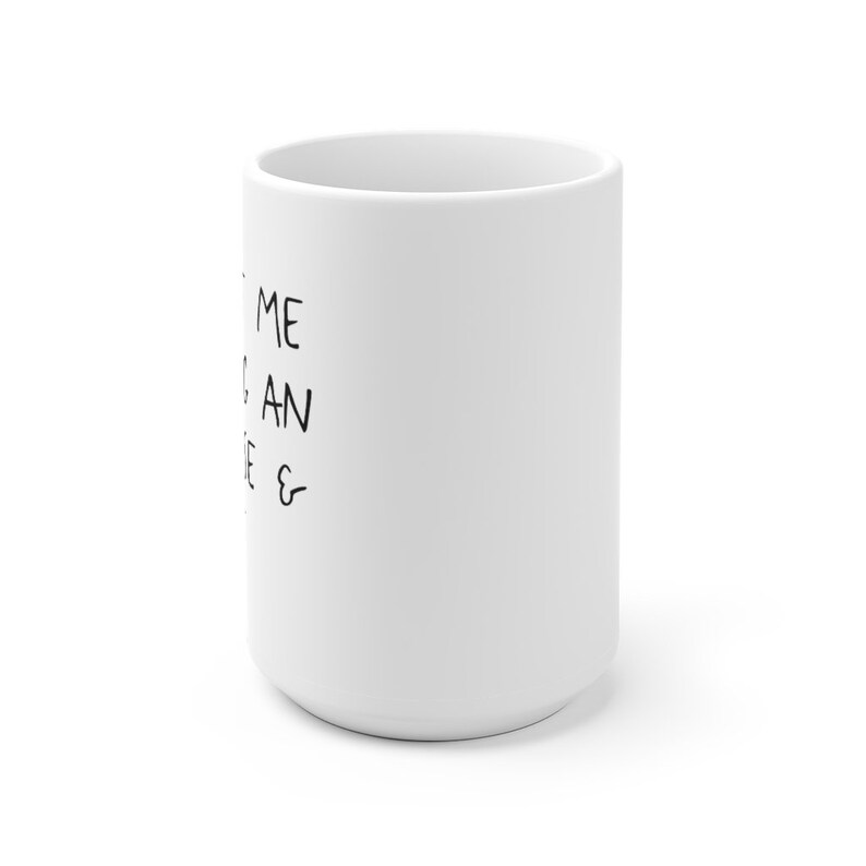May include: White ceramic mug with black text that reads "Give me coffee & an attitude".