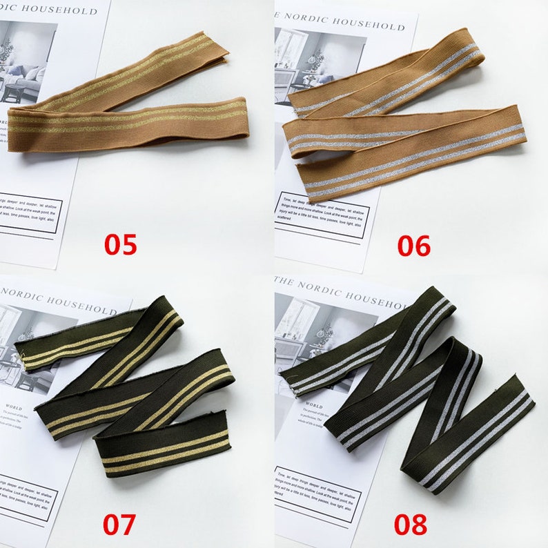 May include: Four different types of elastic ribbon with two stripes. The ribbons are brown with silver stripes, brown with gold stripes, green with gold stripes, and green with silver stripes. The ribbons are labeled with numbers 05, 06, 07, and 08.