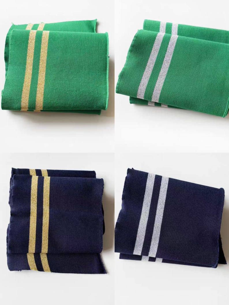 May include: Four folded rectangular cloths in green and navy blue. Two cloths are green with gold stripes, and two are green with silver stripes. The other two cloths are navy blue with gold stripes, and the last two are navy blue with silver stripes.