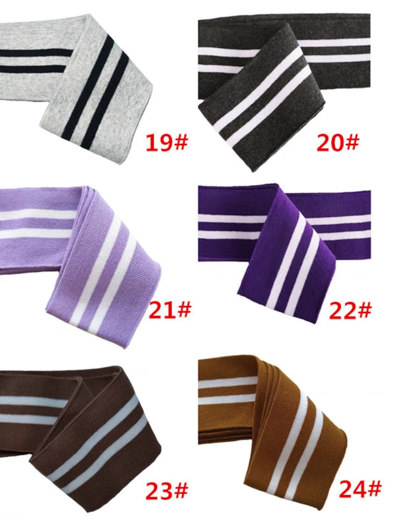 Op de afbeelding: Zes verschillende kleuren gebreide stof met twee witte strepen. De kleuren zijn grijs, donkergrijs, paars, lichtpaars, bruin en beige. De stof is gemarkeerd met de nummers 19, 20, 21, 22, 23 en 24.