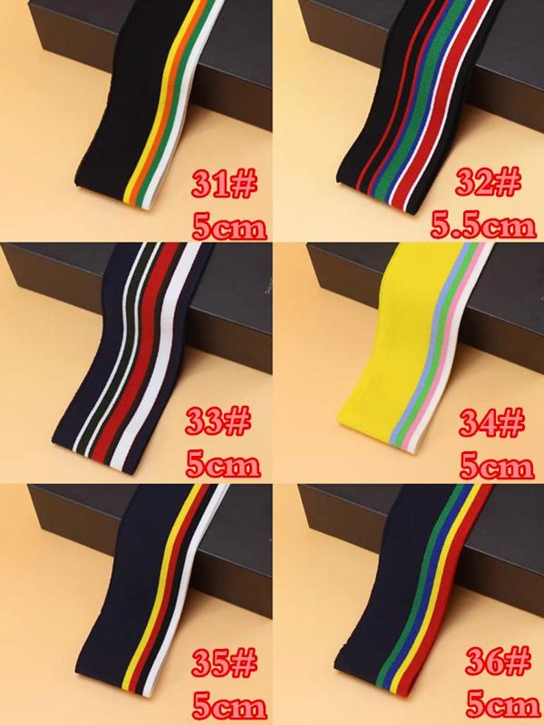 May include: Six different types of elastic trim with colorful stripes. The trim is 5 cm wide, except for the second trim which is 5.5 cm wide. The trim is available in black, yellow, white, and navy blue.