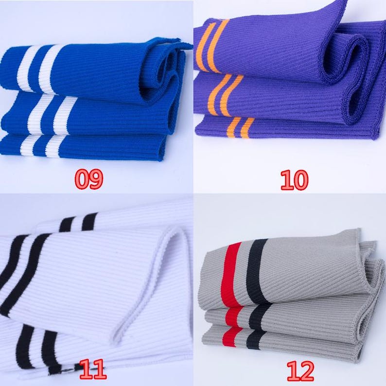 May include: Four pairs of folded athletic socks. The socks are in blue with white stripes, purple with orange stripes, white with black stripes, and gray with red and black stripes. Numbers 09, 10, 11, and 12 are visible.