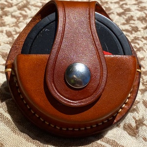 Swedish SNUS or ZYN dip can holder holster with belt clip made of hand-stitched natural full grain leather in traditional or fashion colors. image 1