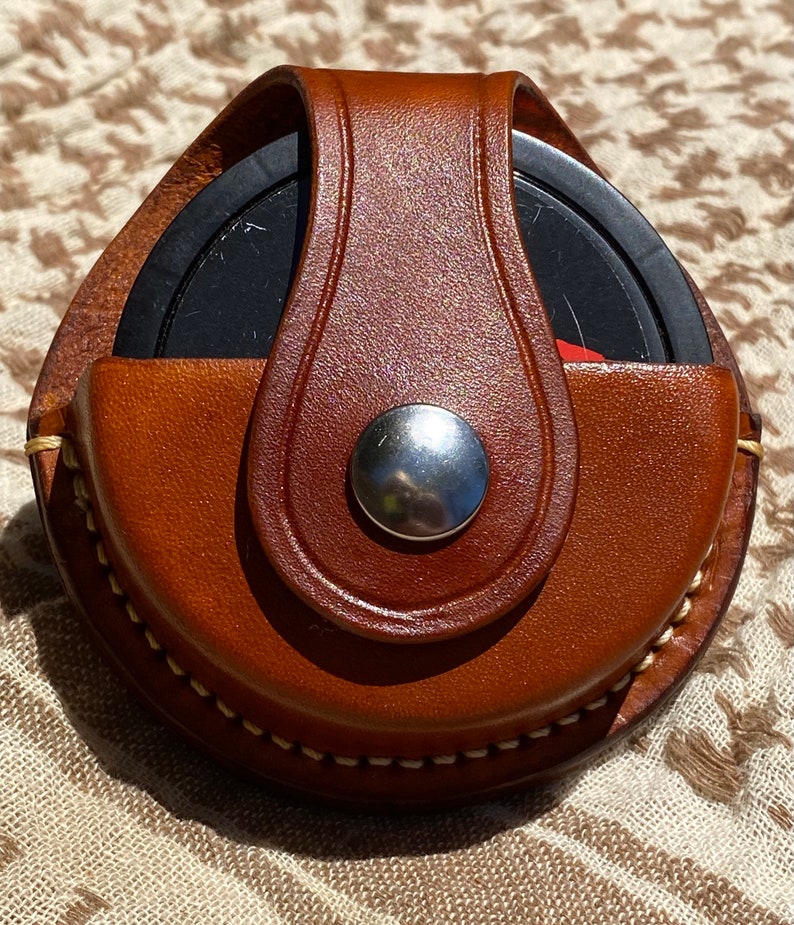 Swedish SNUS or ZYN dip can holder holster with belt clip made of hand-stitched natural full grain leather in traditional or fashion colors. image 1