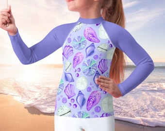 Cute Seashell Sun Shirt for Kids - Summer Rash Guard Shirt with 50+ UPF for Sun Protection - Purple + Lavender Seashells