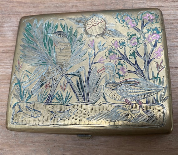 Vintage brass cigarette case with map of India and bi…