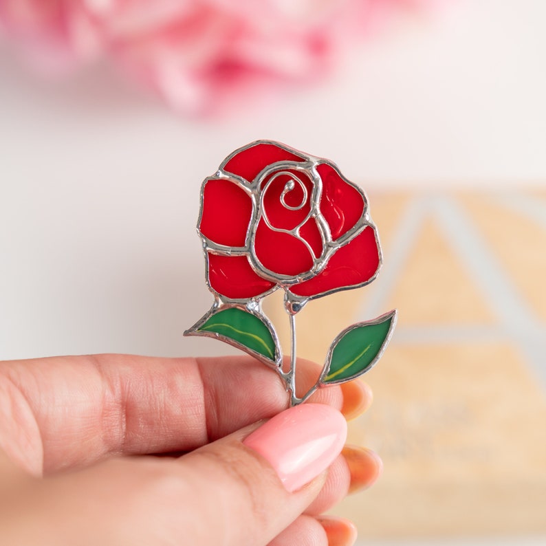 red rose brooch made of modern stained glass