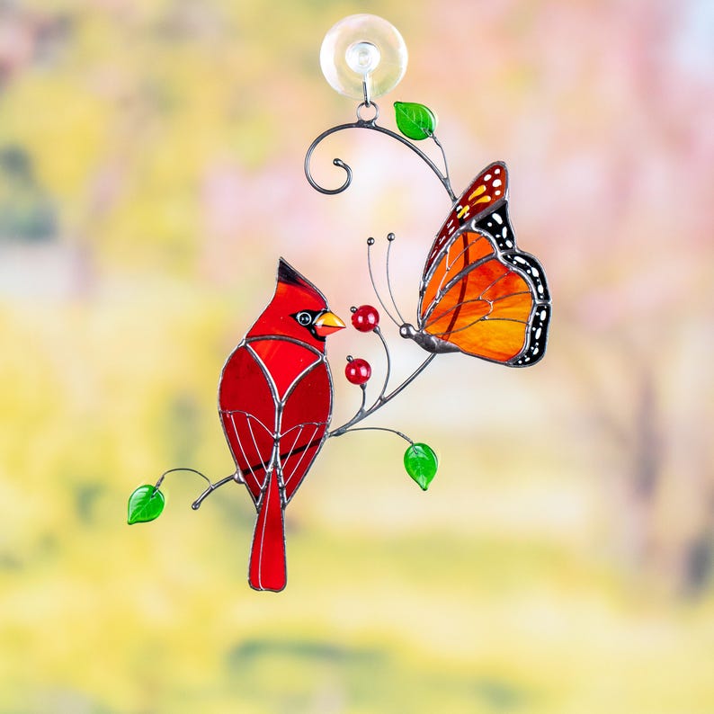 cardinal bird and monarch butterfly item made of modern stained glass