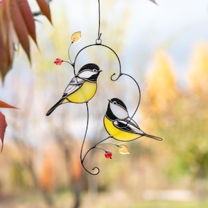 stained glass chickadees in heart shape