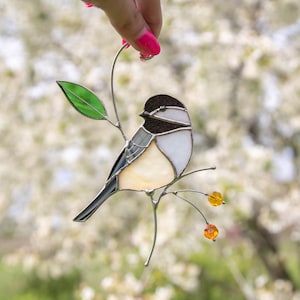 handcrafted glass of chickadee bird decoration