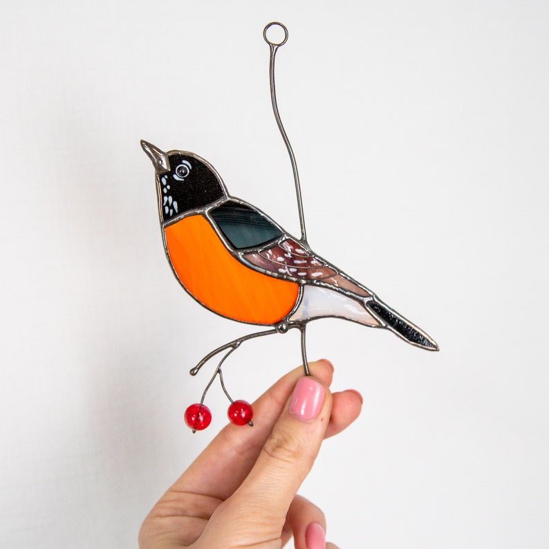 suncatcher of bird with berries