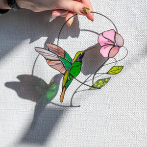 handmade glass hummingbird with the pink flower suncatcher