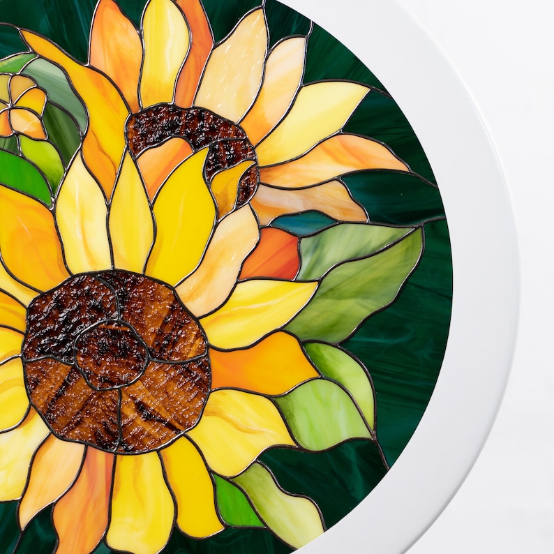 stained glass sunflower panel with the white wood frame