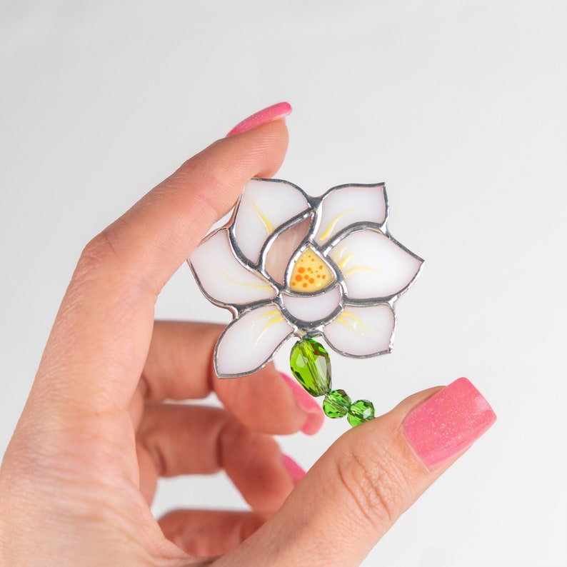 white lotus flower pin made of modern stained glass