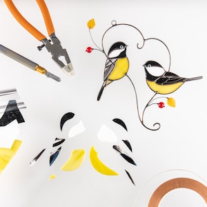 handcrafting process of the pair of chickadees stained glass suncatcher