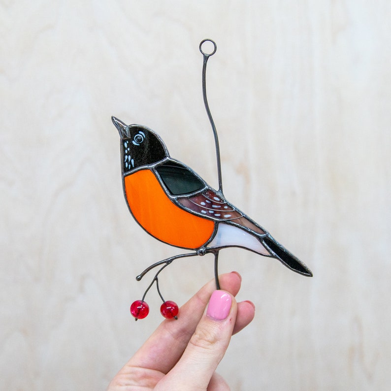 American robin stained glass bird on the branch