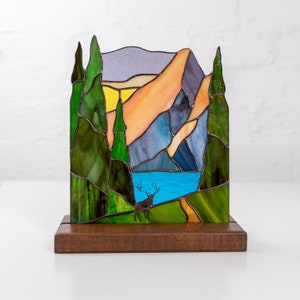 handcrafted glass deer panel on the wooden base
